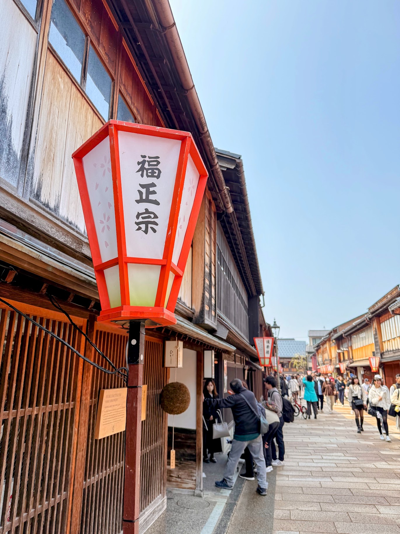 Higashi Chaya street at dusk—the latticed machiya facades of Japan's most intact geisha quarter