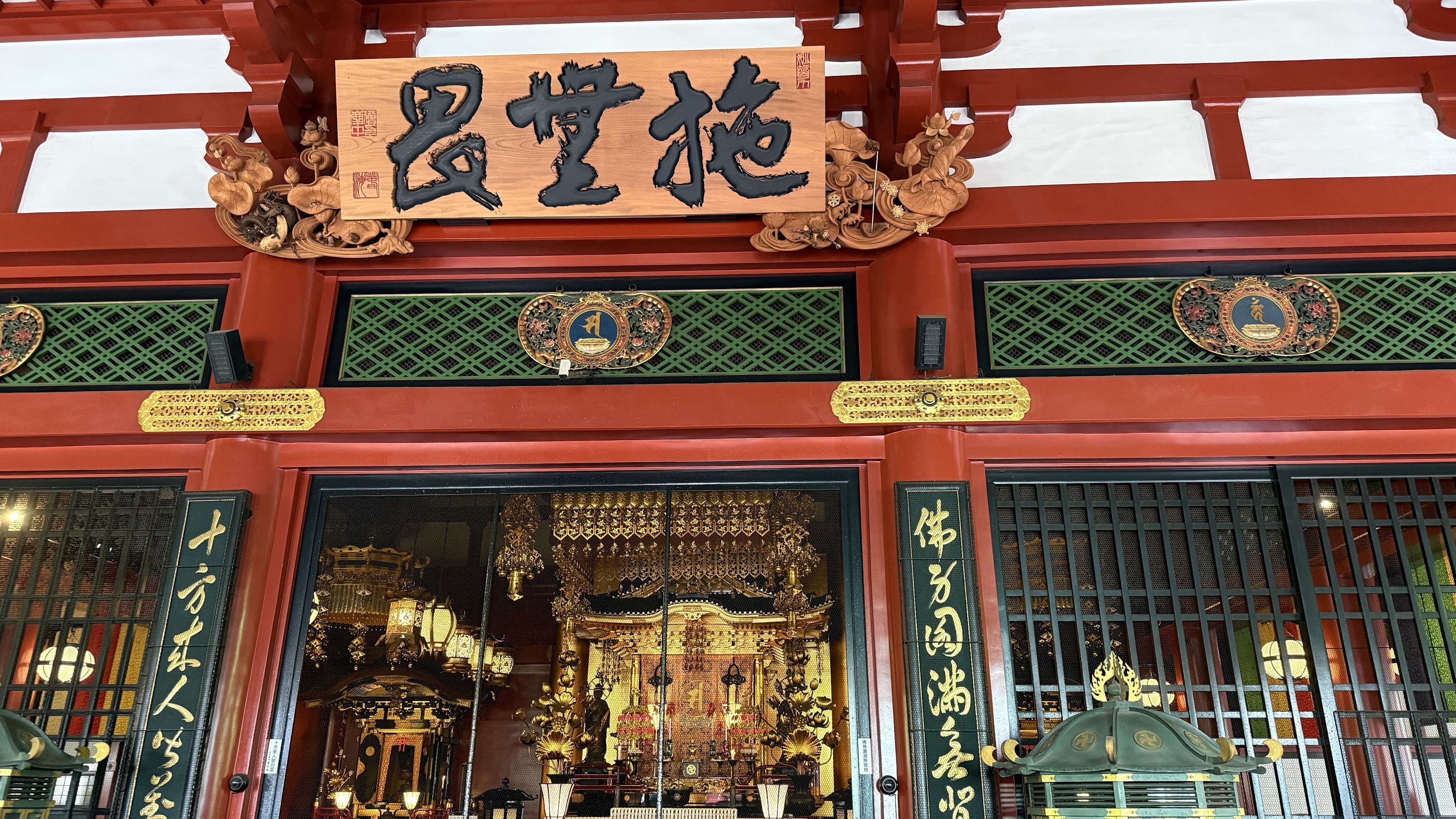 Senso-ji at night—the main hall illuminated until 11 PM, crowds gone, incense rising