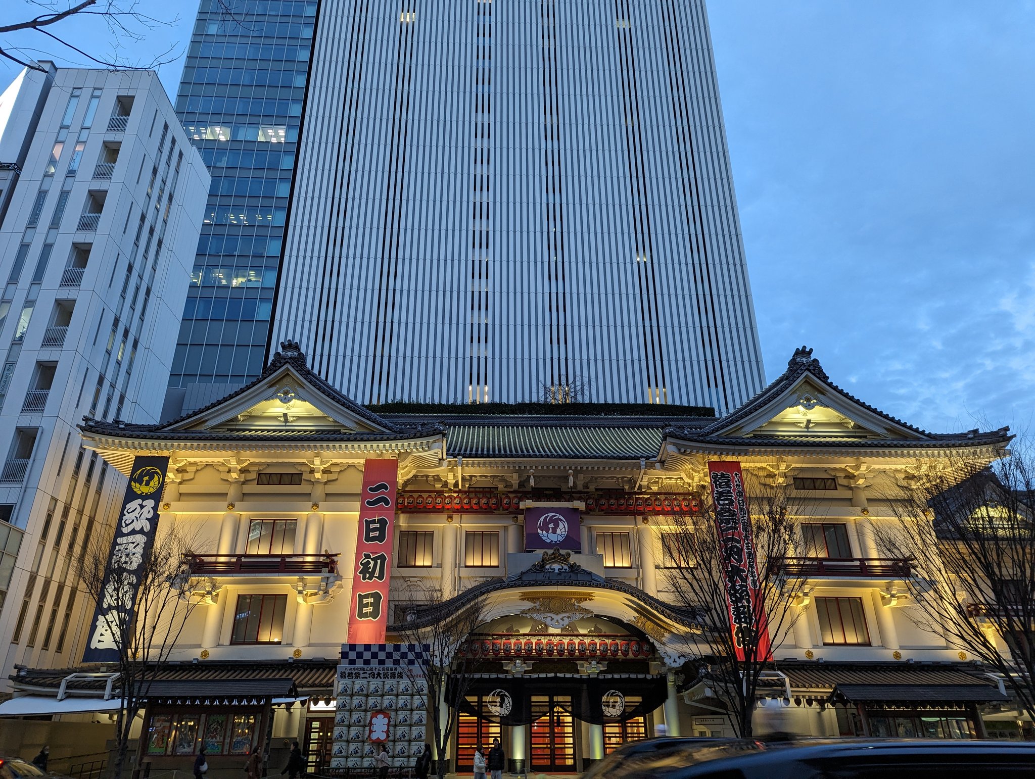 Ginza at dusk — the boutique windows lit, the street beginning to quiet