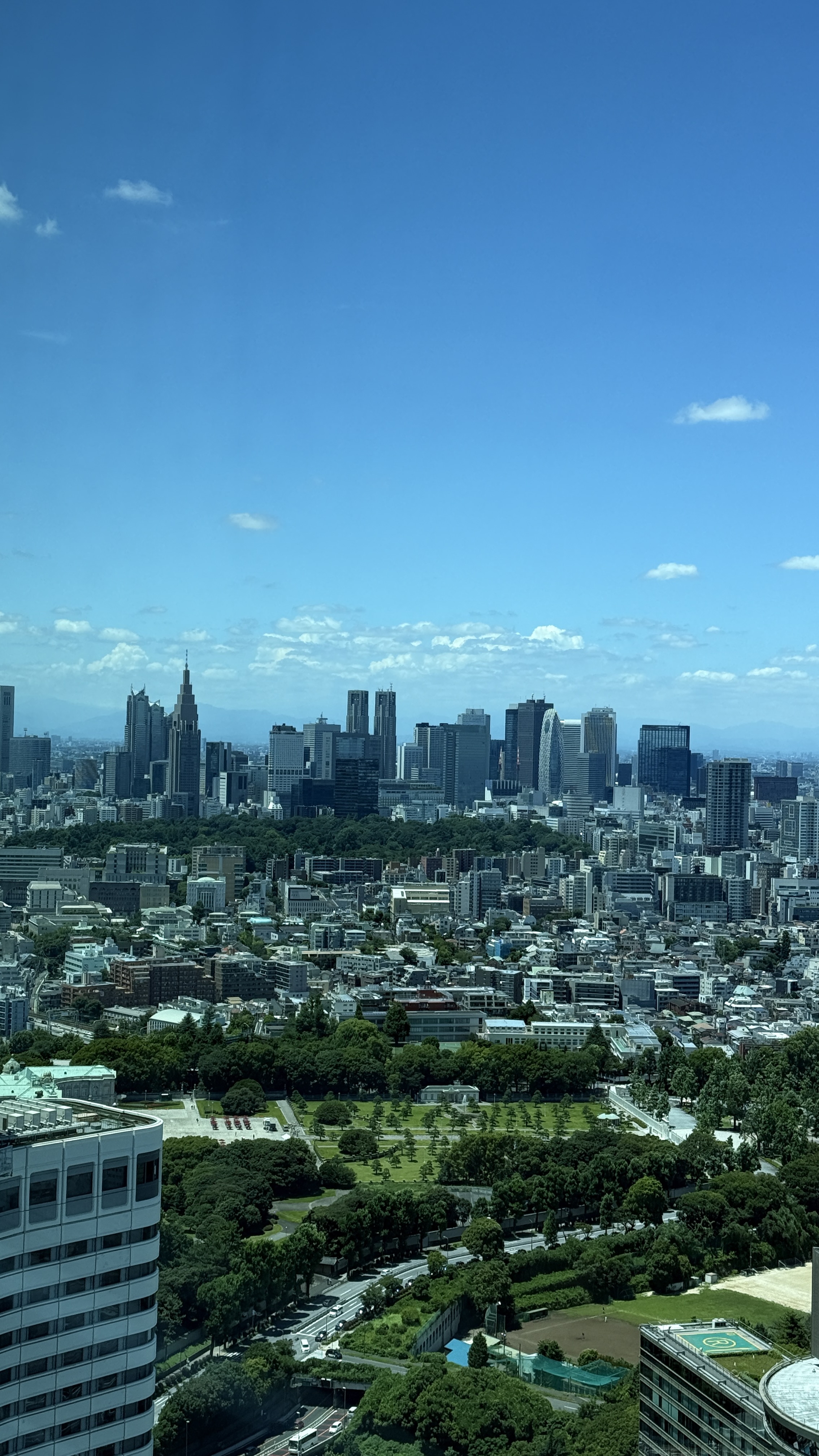 Tokyo Garden Terrace Kioicho complex blending glass architecture with greenery
