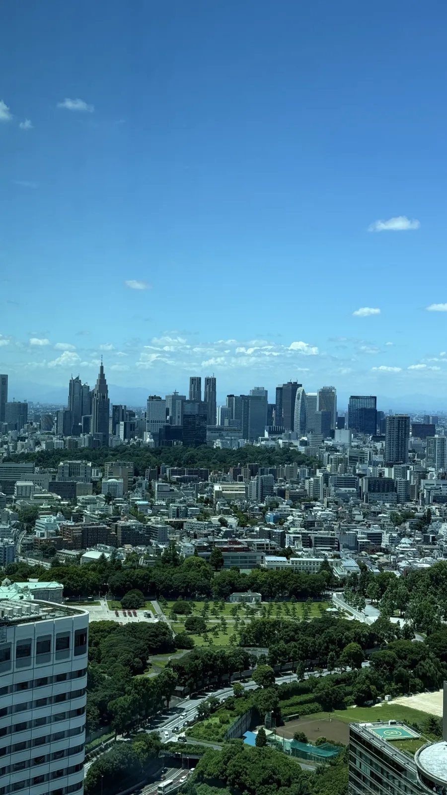 Tokyo Garden Terrace Kioicho complex blending glass architecture with greenery