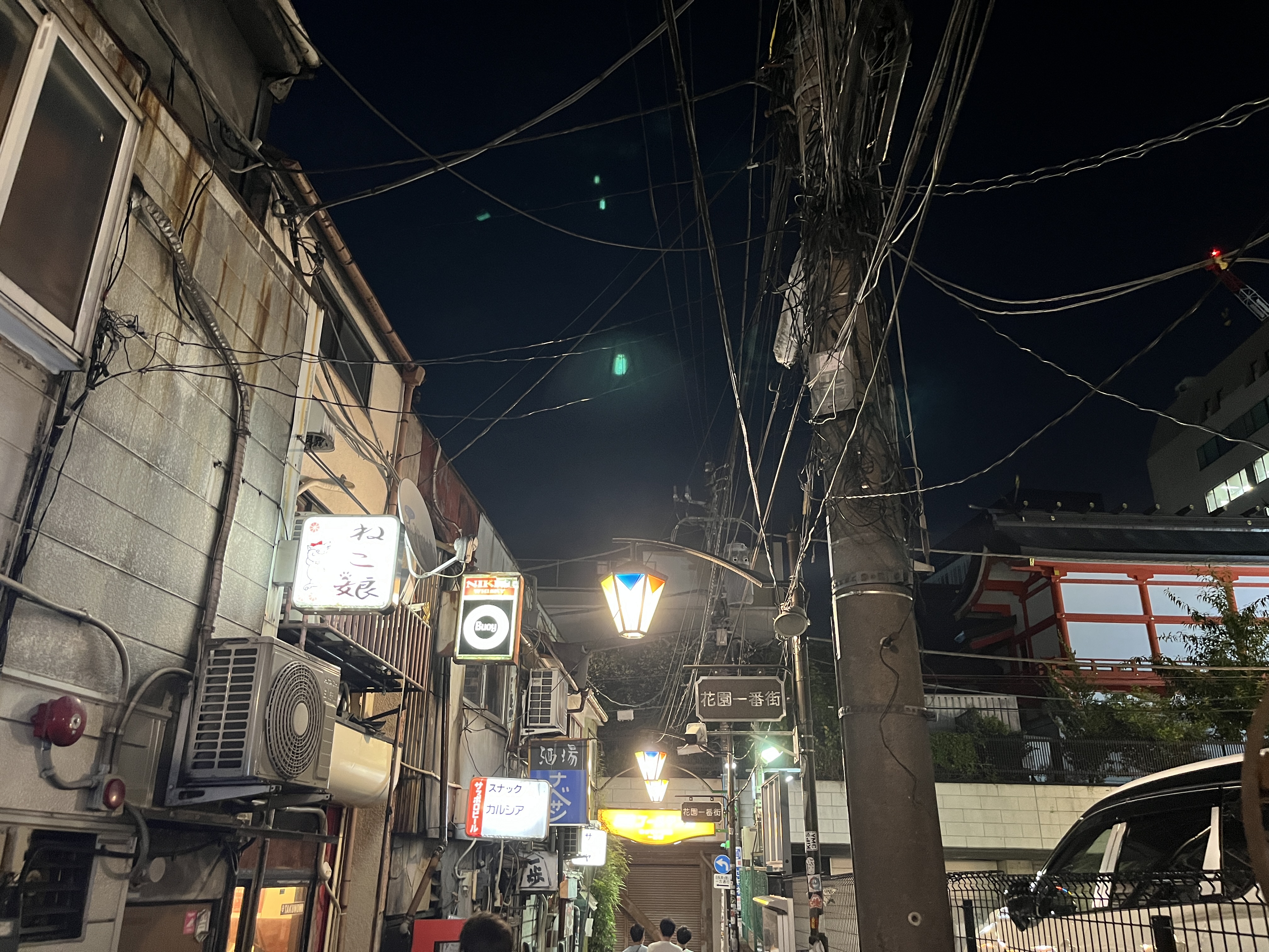 The second alley at dusk, before the evening crowd arrives—the best time to assess your options